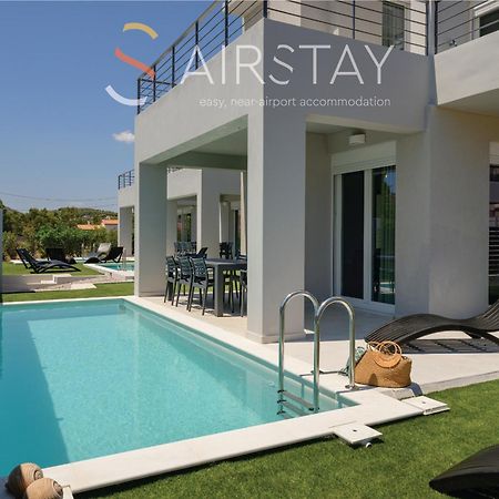 Komos Villas Airport By Airstay Loútsa Exterior foto